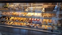 Pick out a dozen cupcakes at Magnolia Bakery