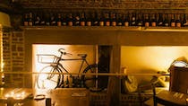 Share a bottle of wine over dinner at Thin White Duke