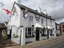 Enjoy a Classic British Pub Experience at The Swan Inn