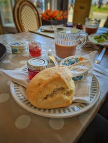 Order the cream tea at Dolly's Cafe