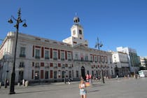 See the postcard sights at Puerta del Sol