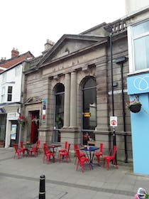 Enjoy a delicious meal in a former bank at Bank Café