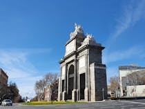 Walk under Puerta de Toledo