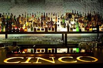 Have a drink at Cinco lounge
