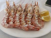Try the seafood at Bar Restaurante Victoria