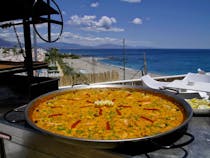 Enjoy a paella by the sea at Seaside Grill & Bar