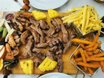 Try the authentic dishes at Casa De Pasto O Petisco