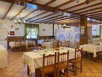 Try local cuisine at Restaurante Venta El Túnel