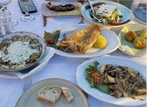 Share an array of dishes at Aristos Fish Restaurant