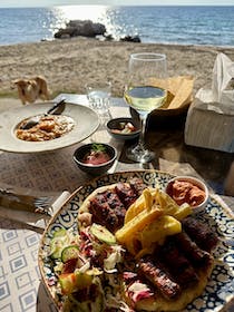 Sample local flavours at Αρσανάς Restaurant