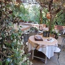 Dine in the garden at La Faucado