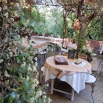 Dine in the garden at La Faucado