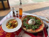 Indulge in pizza at L'Angolo Italiano