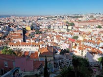 Watch the sunset at Miradouro de Graça