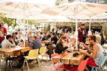 Chill on the terrace of the Makamaka Beach Burger Café