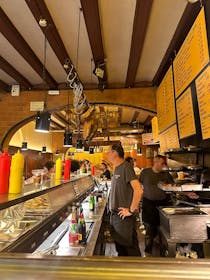 Experience a true Catalan tavern at La Xampanyeria