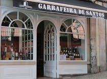 Pick up a bottle of wine at Garrafeira de Santos