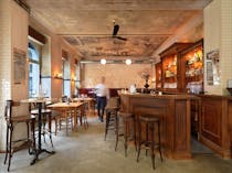 Try a new cocktail at trendy Beuster