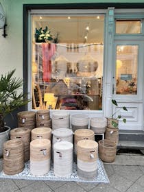 Lampshades, pillows & baskets galore! Shop for sustainable home essentials at the The Goods store.