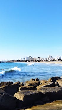 Take a leisurely stroll at Molhe Praia da Rocha