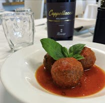 Dine at Taverna Del Piffero