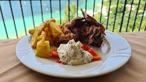 Try the slow-cooked lamb at Taverna Athitis