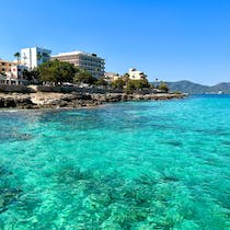 Enjoy the stunning beauty of Playa Petita Cala Bona