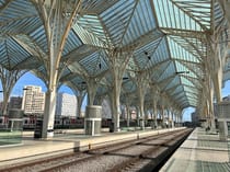 Admire the architecture of Oriente Station