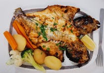 Enjoy the grilled seafood at Meridiano