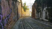 Go up the hill in the historic Lavra funicular