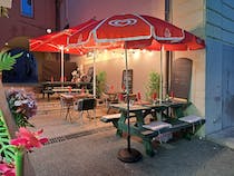Enjoy a meal on the terrace at La Cantina Café-Restaurant
