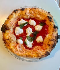 Savour authentic Italian pizzas at Rouge Pizze & Aperitivo