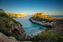 Explore Cala Vientre's Pristine Waters