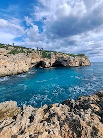 Explore the Stunning Pont natural d'Es Caló Blanc
