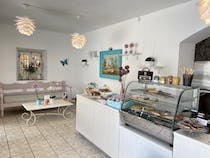 Indulge in Sweet Margarita's homemade cakes and smoothies