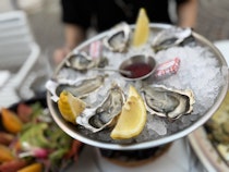 Savour local oysters and sea shell at Le Petit Oyster Bar