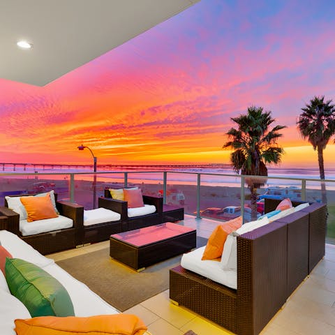 Watch the unreal sunsets with drinks on the balcony