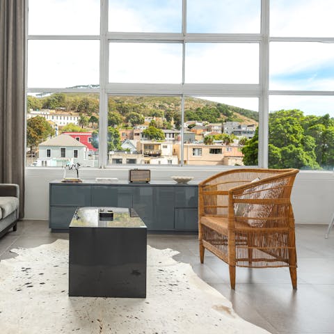 Admire the lovely views of Signal Hill and the colourful homes of Bo Kaap