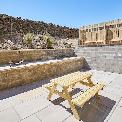 Take a book outside and enjoy the patio on a sunny afternoon