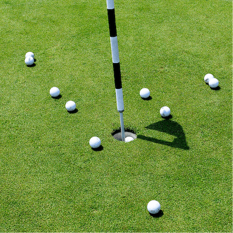 Play a few holes at the nearby golf course