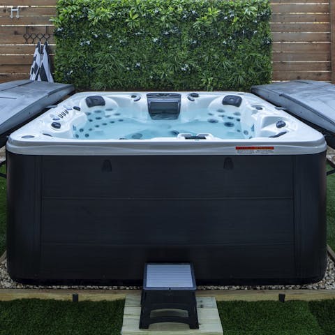 Hop in the hot tub to unwind after a busy day out and about