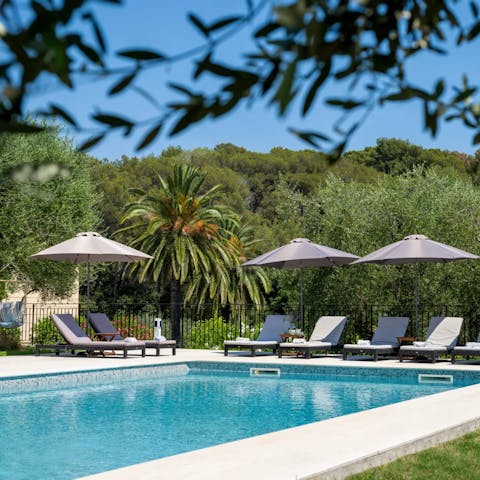 Cool off in the crystalline waters of the outdoor pool