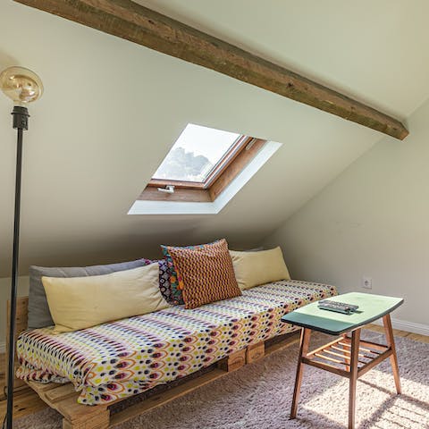 Cosy up on the futon made of upcycled shipping pallets