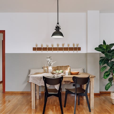 Grab a glass of wine and go over a few emails at the dining table