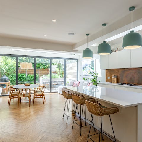 Gather around the dining table in the light-filled kitchen for a full English breakfast