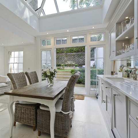 Open the French doors to the garden and enjoy breakfast in the beautiful and light kitchen