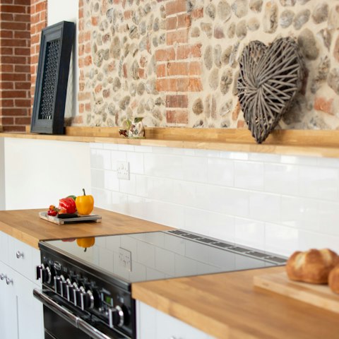 Prepare a mouth-watering Sunday roast in the kitchen to share underneath the vaulted ceilings