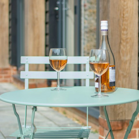 Enjoy a glass of rosé on the south-facing patio as the day draws to a close
