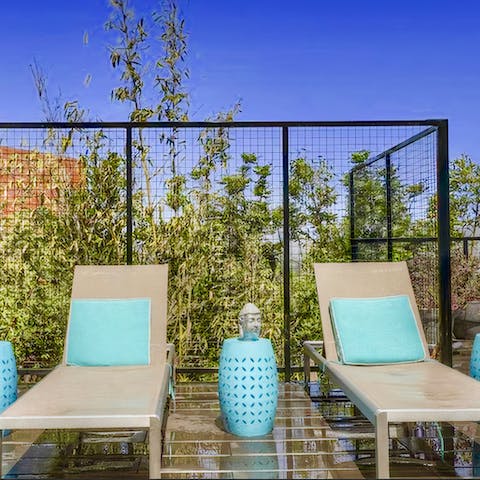 Lie back and relax on a lounger and soak up the sunshine