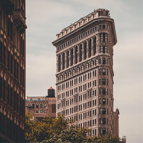 Visit the iconic Flatiron Building, a ten-minute walk away